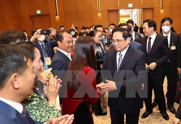 PM meets OVs joining “Xuan Que huong” programme
